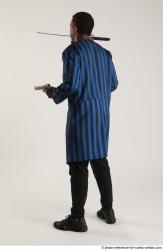 Garson STANDING POSE WITH KATANA AND TWO GUNS